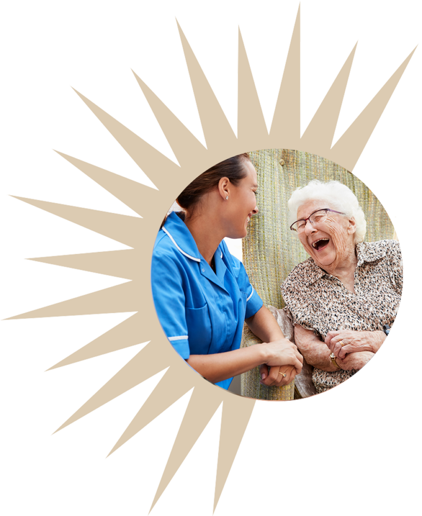 a nurse and senior laugh