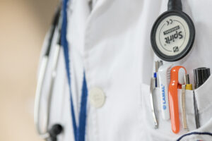a closeup of a doctor's lapel pocket
