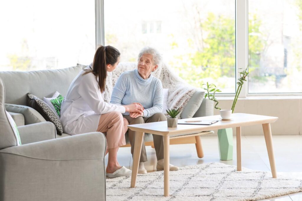 Woman talks to senior about the TRU Healthcare Team