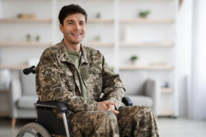 Veteran smiles as he considers researching a guide to home health services for veterans