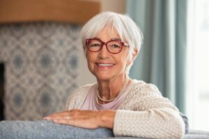 Woman smiles after learning the many benefits of medication management services