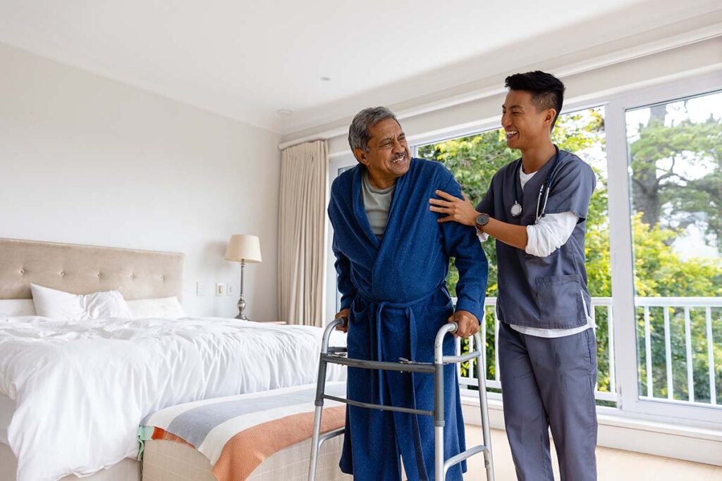 Home health aide helps senior while discussing a comprehensive guide to home health aide services