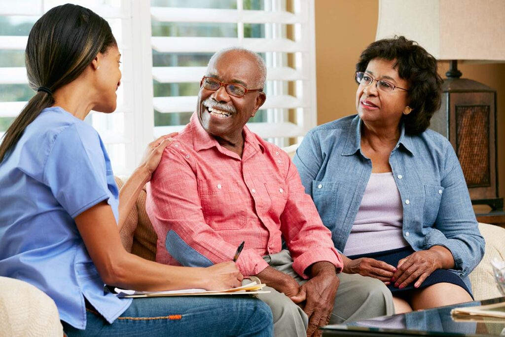 Nurse talks to her seniors about home care for parents
